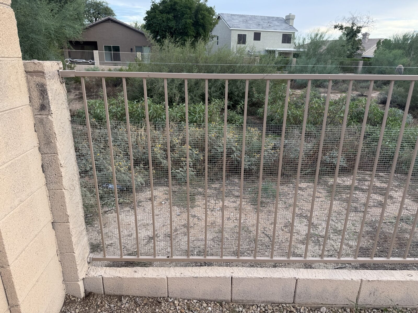 After: view fence with snake mesh secured to the outside